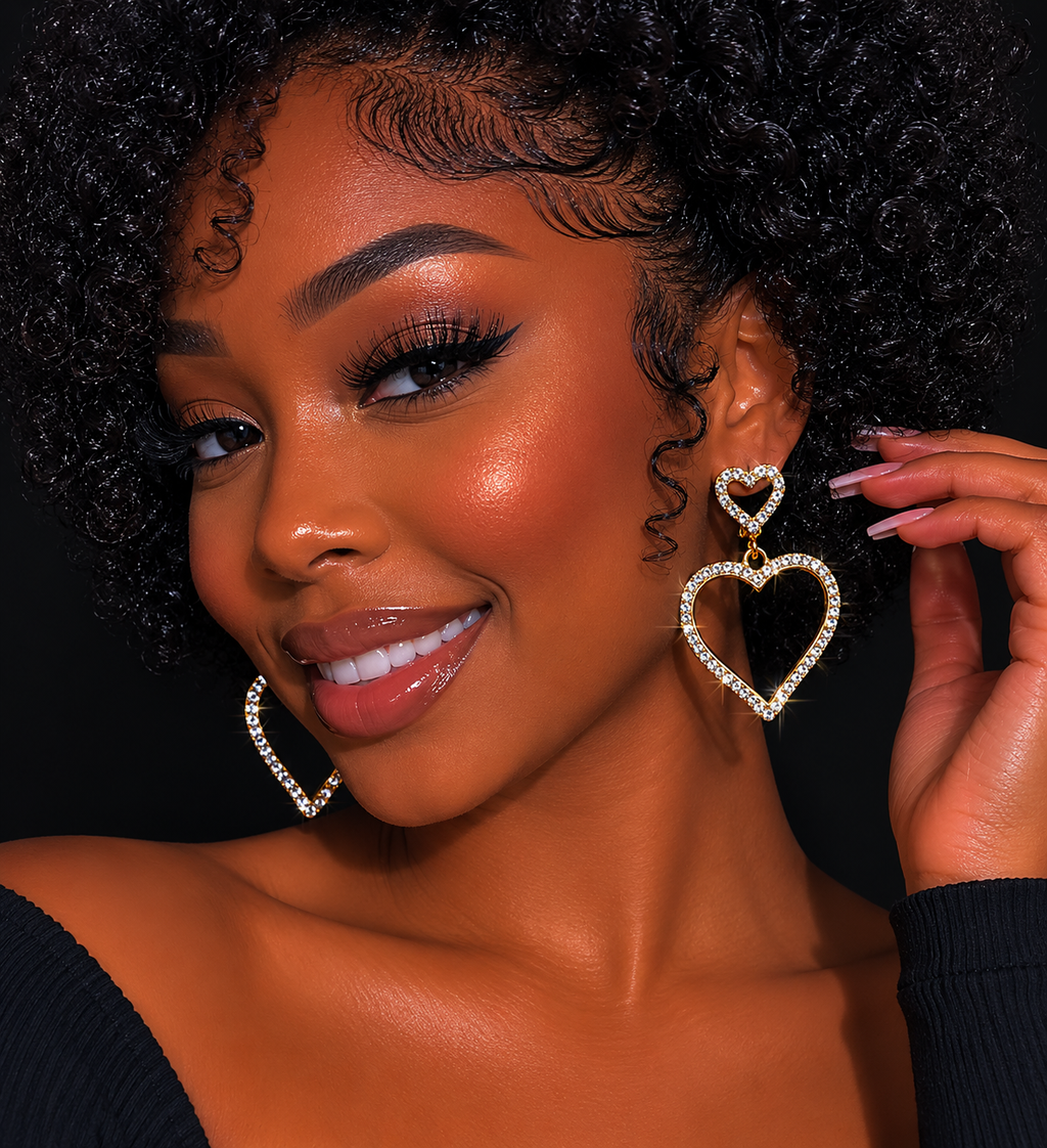 Woman wearing heart-shaped earrings with a black background